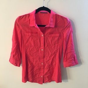 Red button down blouse by Elie Tahari